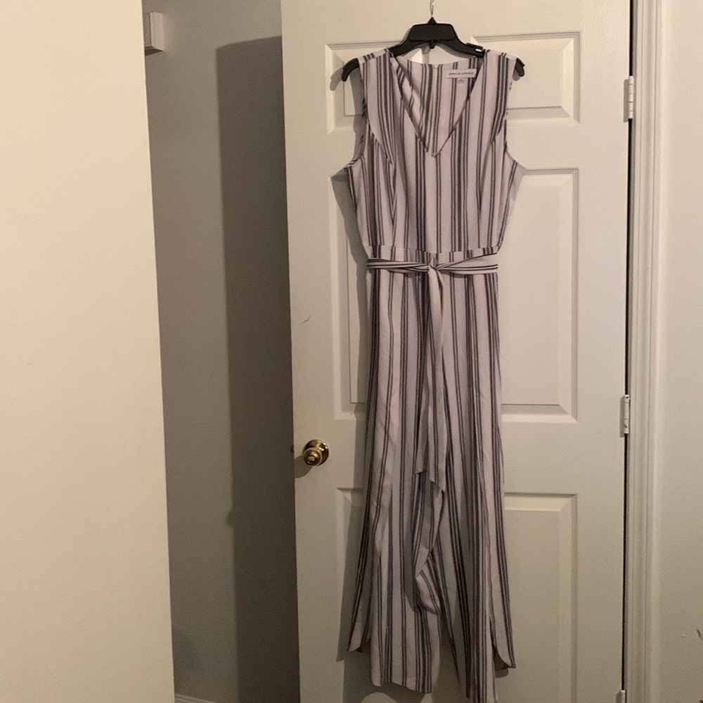 Black and white jumpsuit. The jumpsuit has splits on the side of the legs